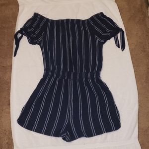 Two off the shoulder rompers.